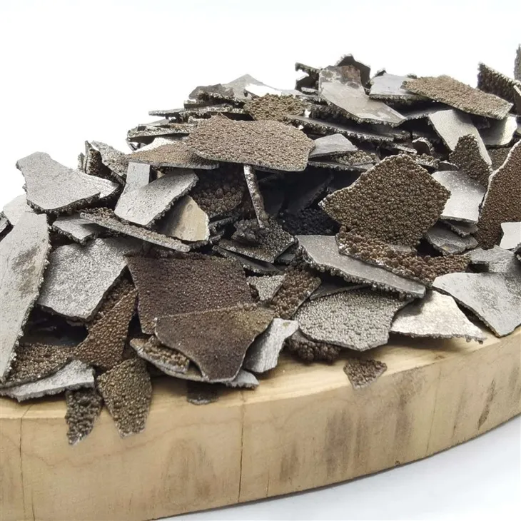 Flocos eletrolíticos de manganês